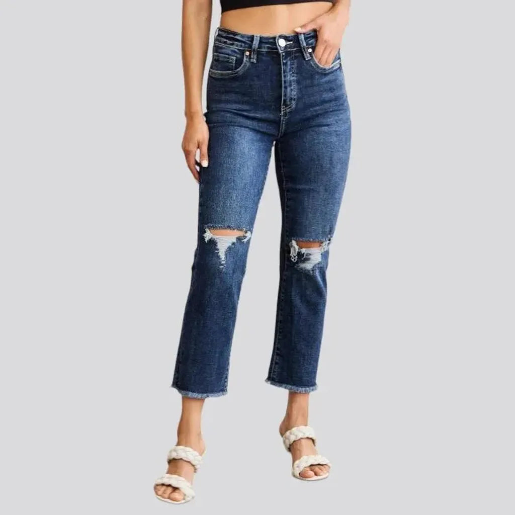 Frayed women's high-waist jeans