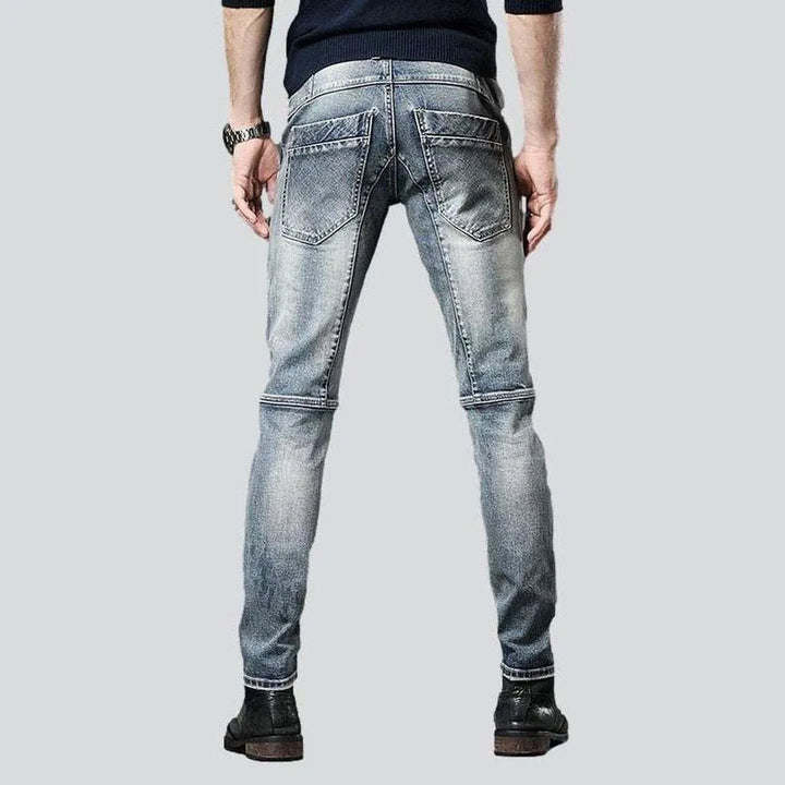 Biker jeans with diagonal pockets