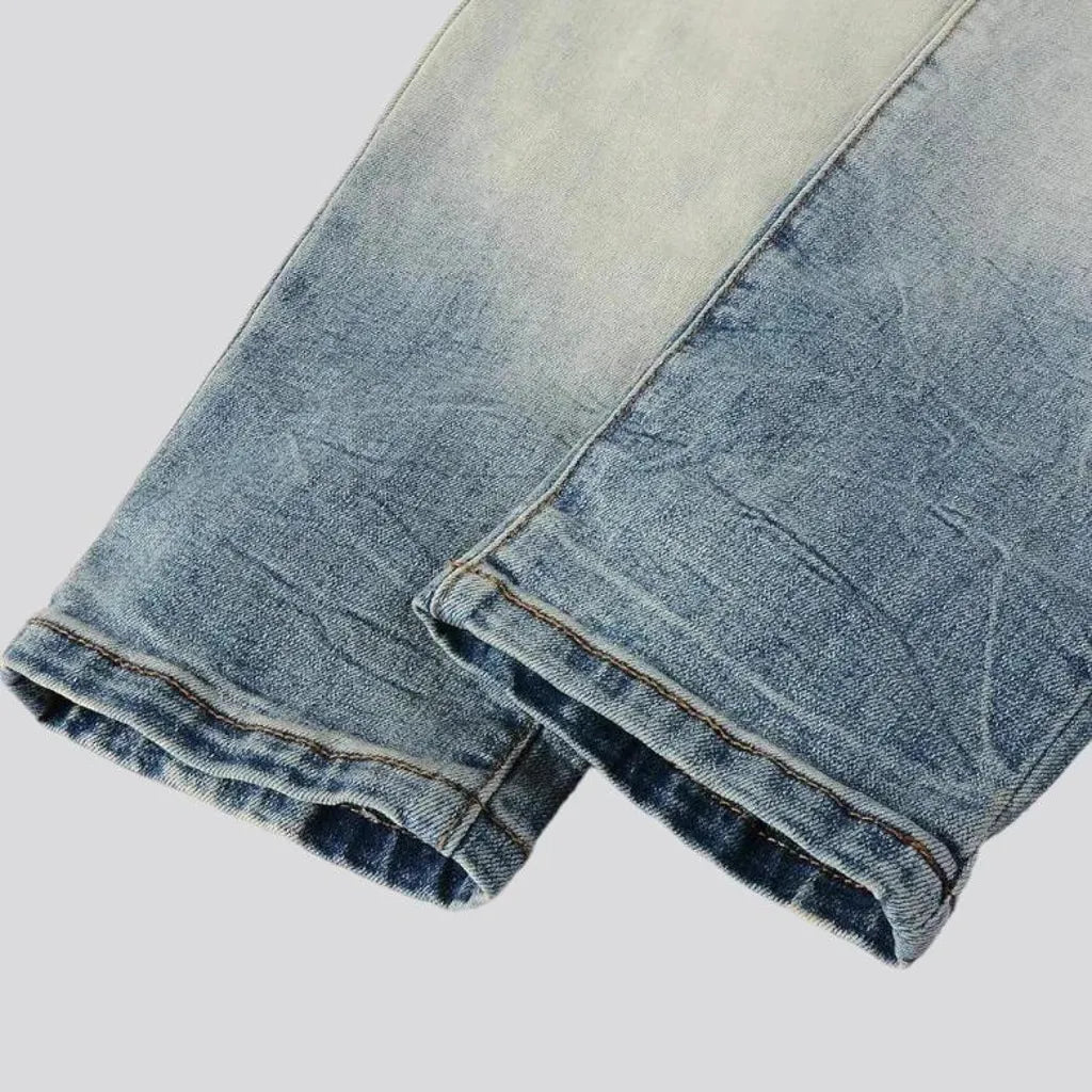 Aged men's whiskered jeans