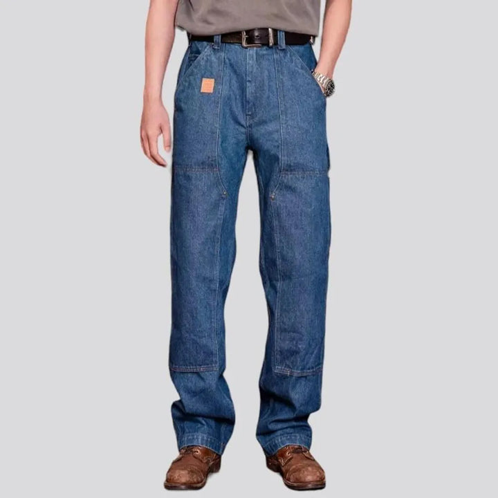 Straight medium-wash work jeans
 for men