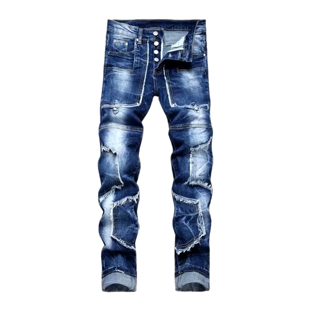 Damaged men's mid-waisted jeans