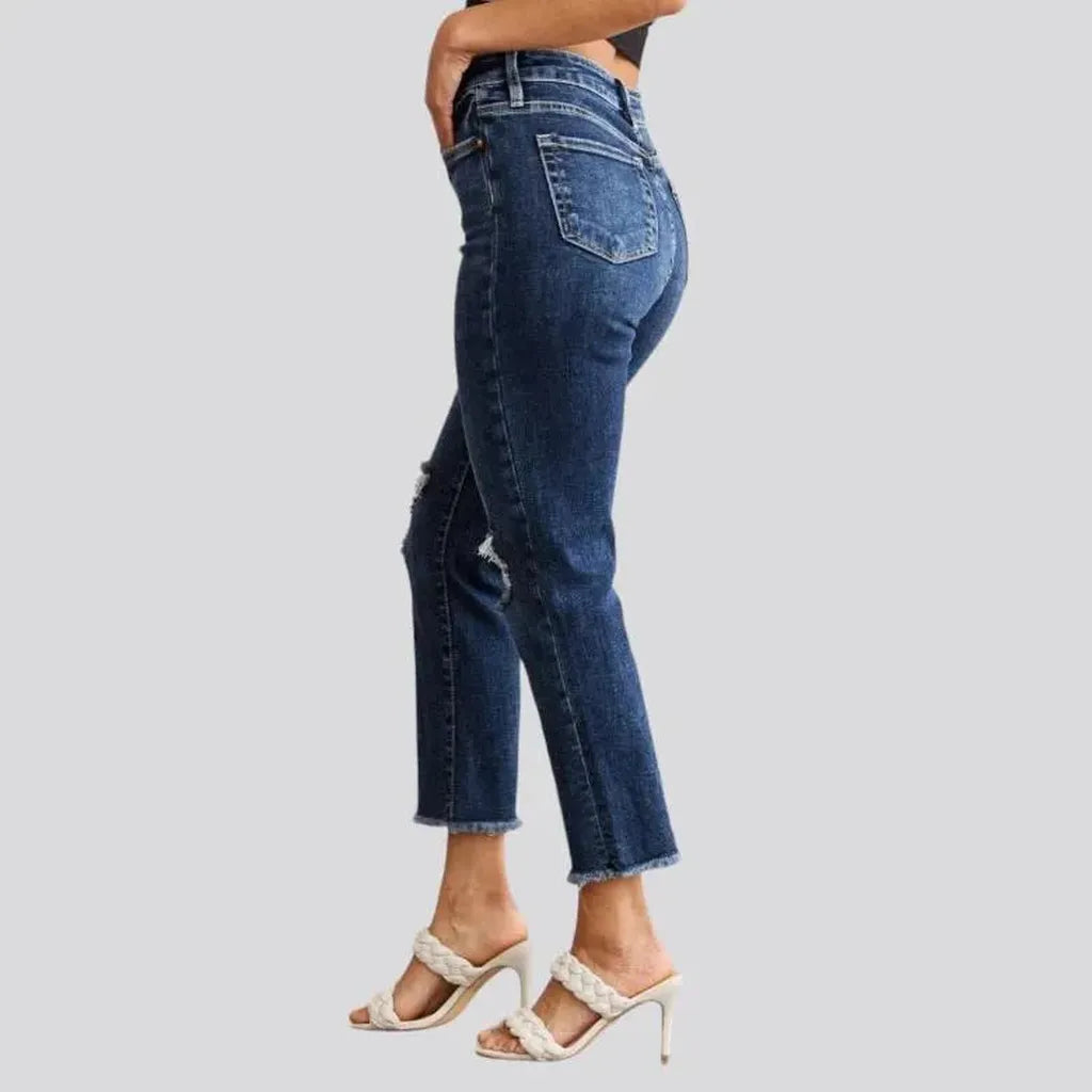 Frayed women's high-waist jeans