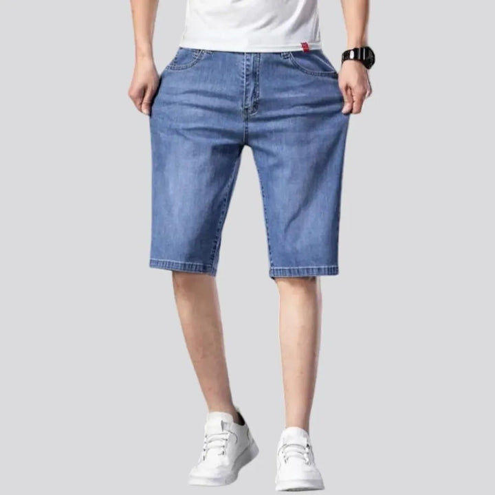 Knee-length men's denim shorts