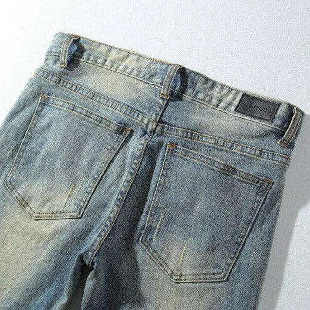 Distressed knees jeans for men