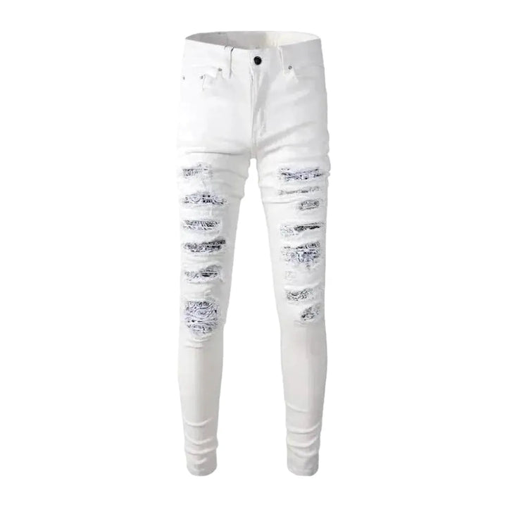 Distressed painted-patches jeans for men