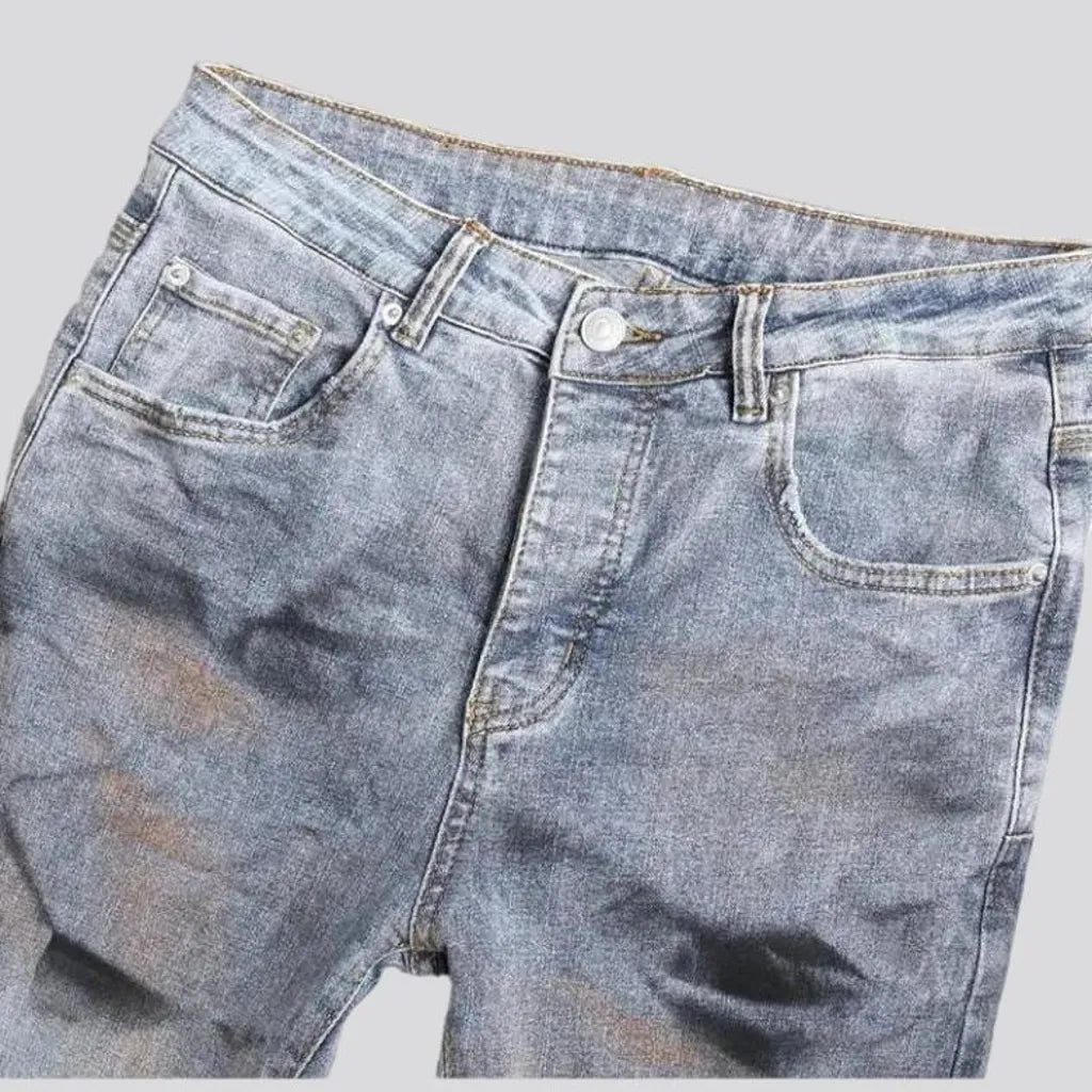 Paint-stains men's mid-waist jeans