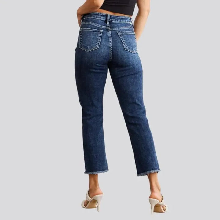 Frayed women's high-waist jeans