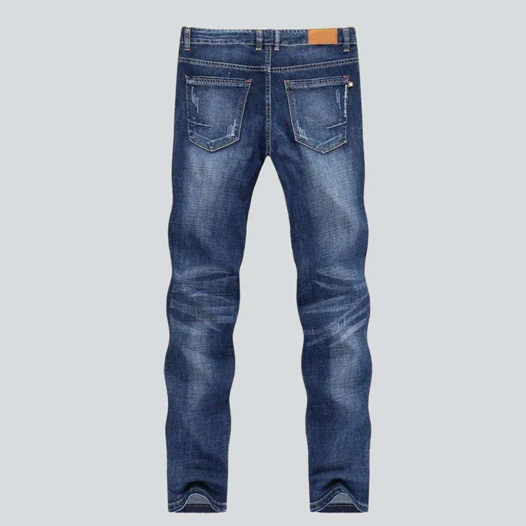 Whiskered medium wash men's jeans