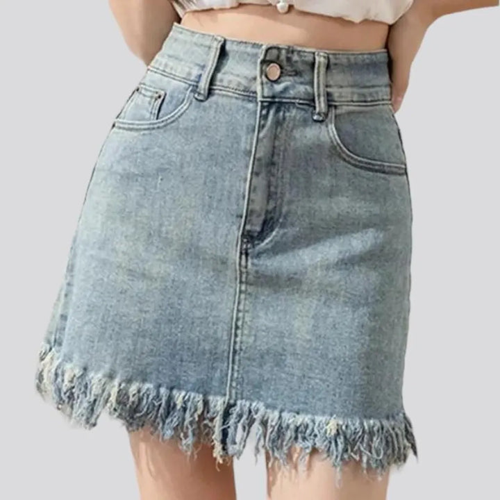 Fringe-hem light-wash denim skort