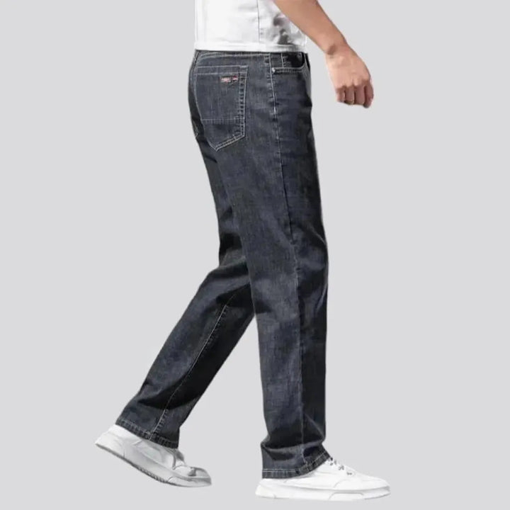 Thin men's stonewashed jeans