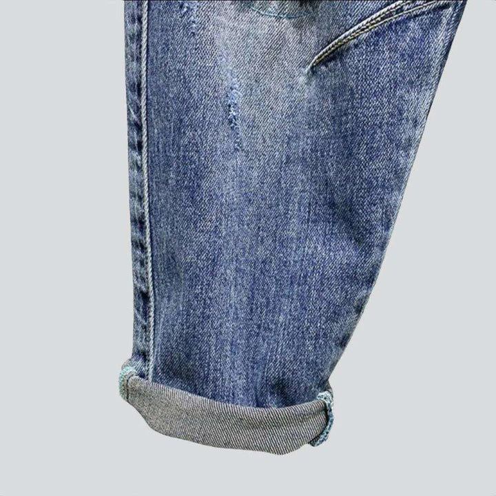 Ripped light blue men's jeans