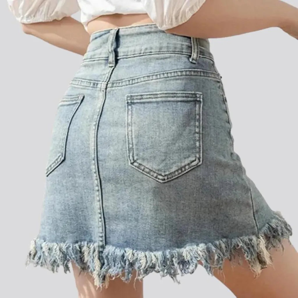 Fringe-hem light-wash denim skort