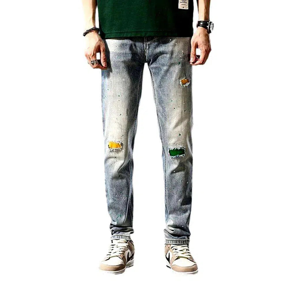 Grunge men's distressed jeans