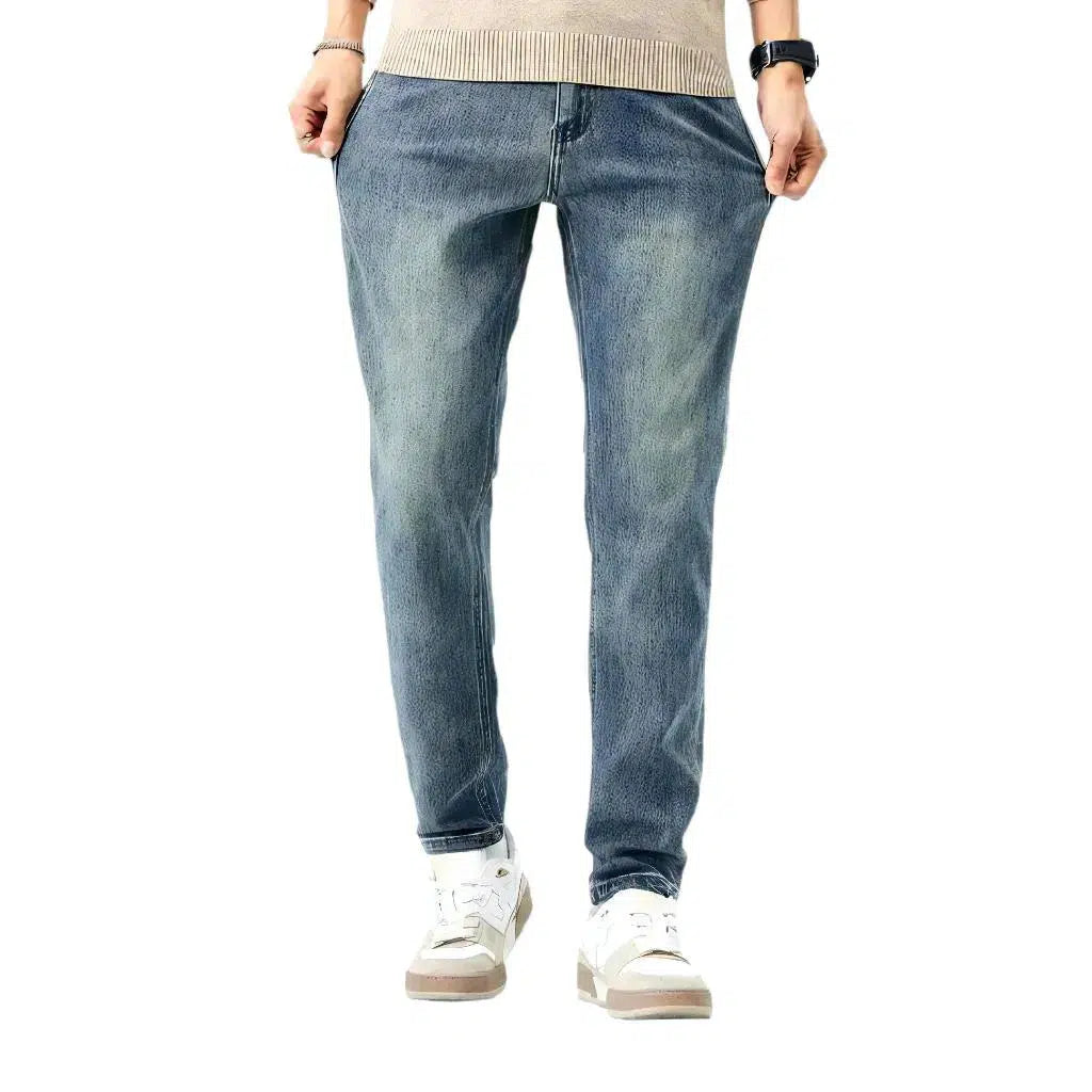 High-waist men's light-wash jeans