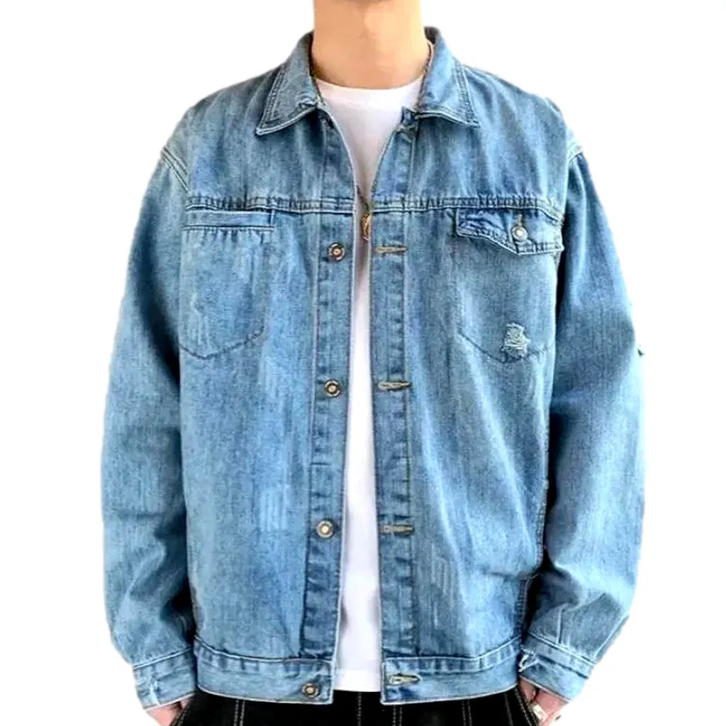 Light-wash distressed jeans jacket