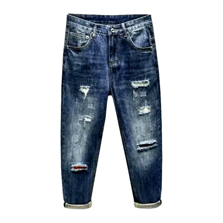 Medium-wash men's loose jeans