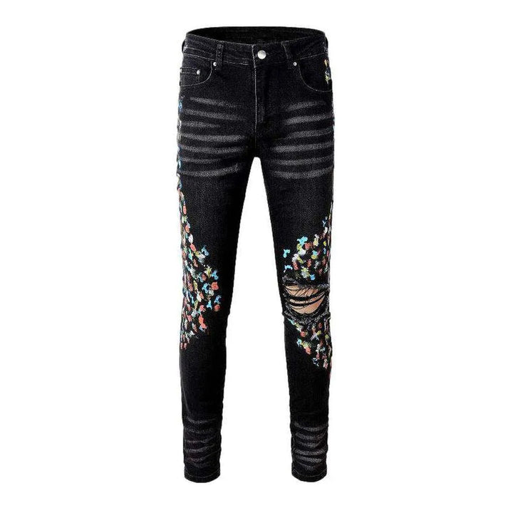 Multicolor stains painted men's jeans