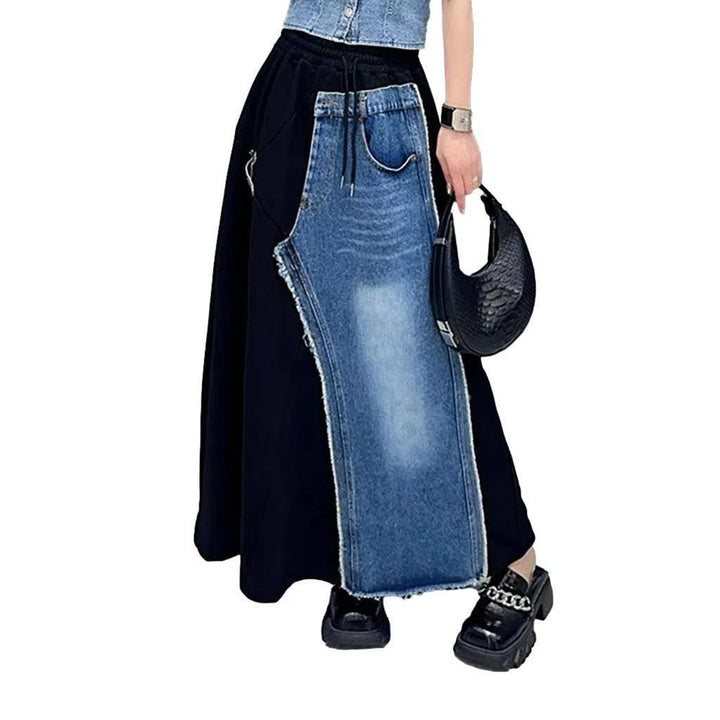 Raw hem whiskered denim skirt