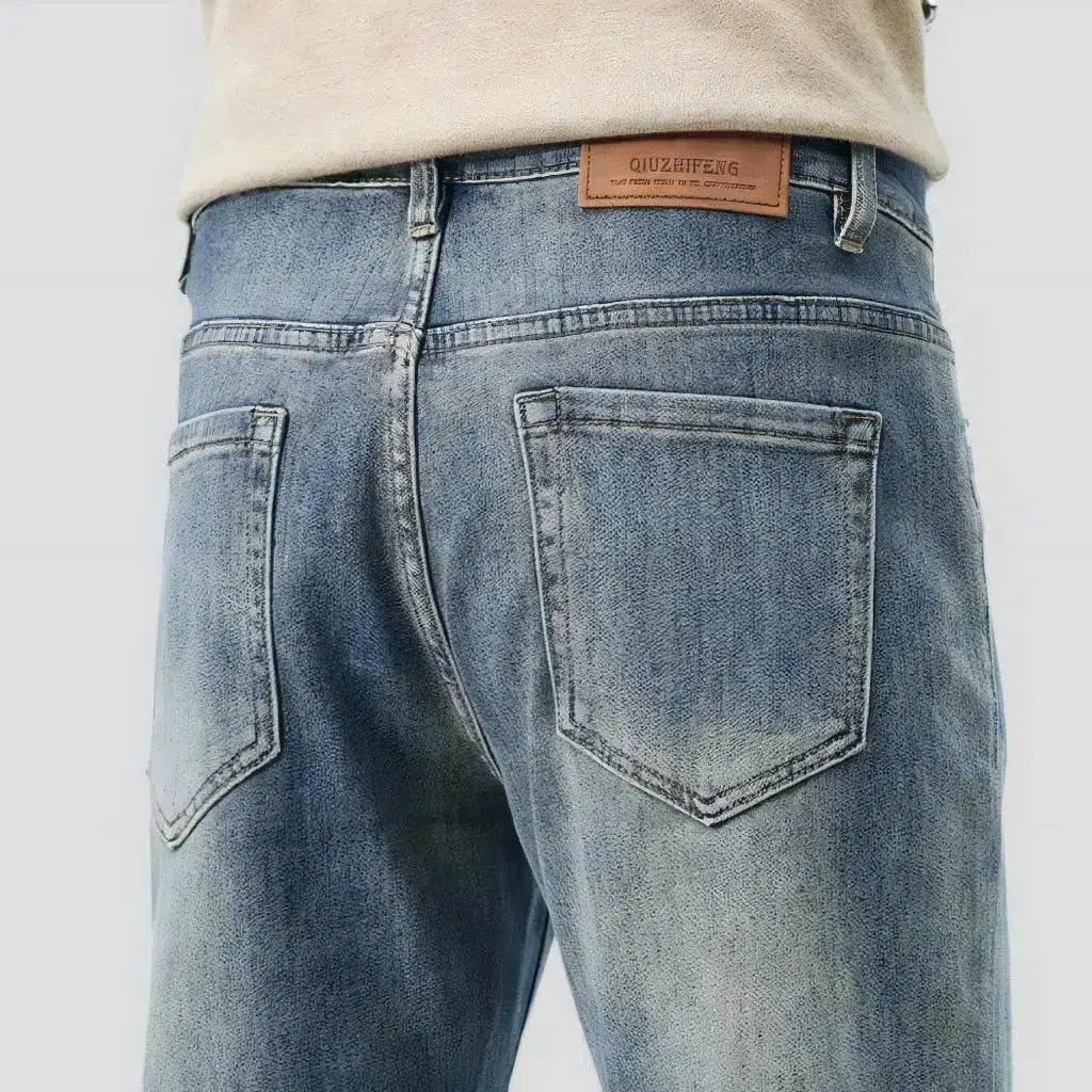 High-waist men's light-wash jeans